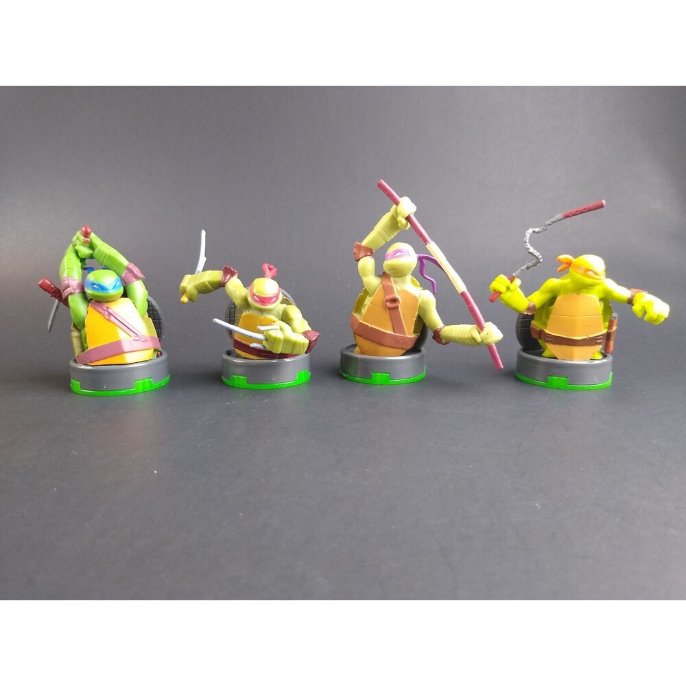 Teenage Mutant Ninja Turtles Viacom 2014 TMNT Set Of 4 Sewer Manholes Plastic
